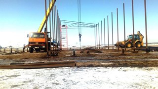 Аренда экскаватора погрузчика с ямобуром в Холмск цена от 1559 руб
